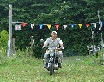 村長さんのバイク走行