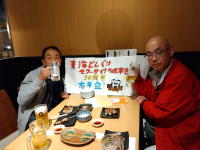 ５０周年の忘年会横断幕とともに